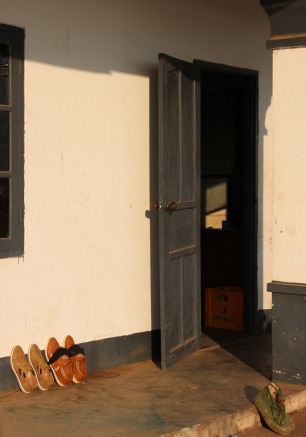 Door with shoes outside